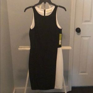 NWT. Black Dress with white colorblock. Size 4